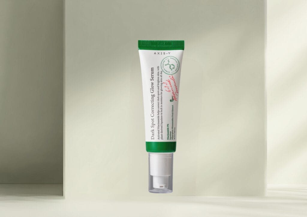 Close-up texture of Axis-Y Dark Spot Correcting Glow Serum showing the lightweight, non-greasy consistency suitable for skin over 40