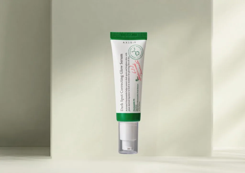 Close-up texture of Axis-Y Dark Spot Correcting Glow Serum showing the lightweight, non-greasy consistency suitable for skin over 40